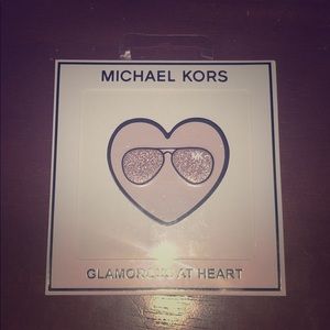 Michael Kors leather sticker glamorous at heart